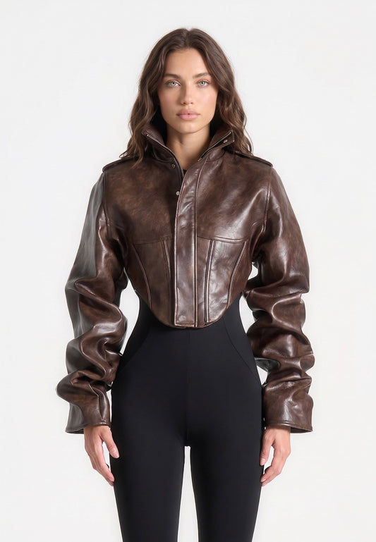 Vintage leren korsetjack met klinknagelmouwen