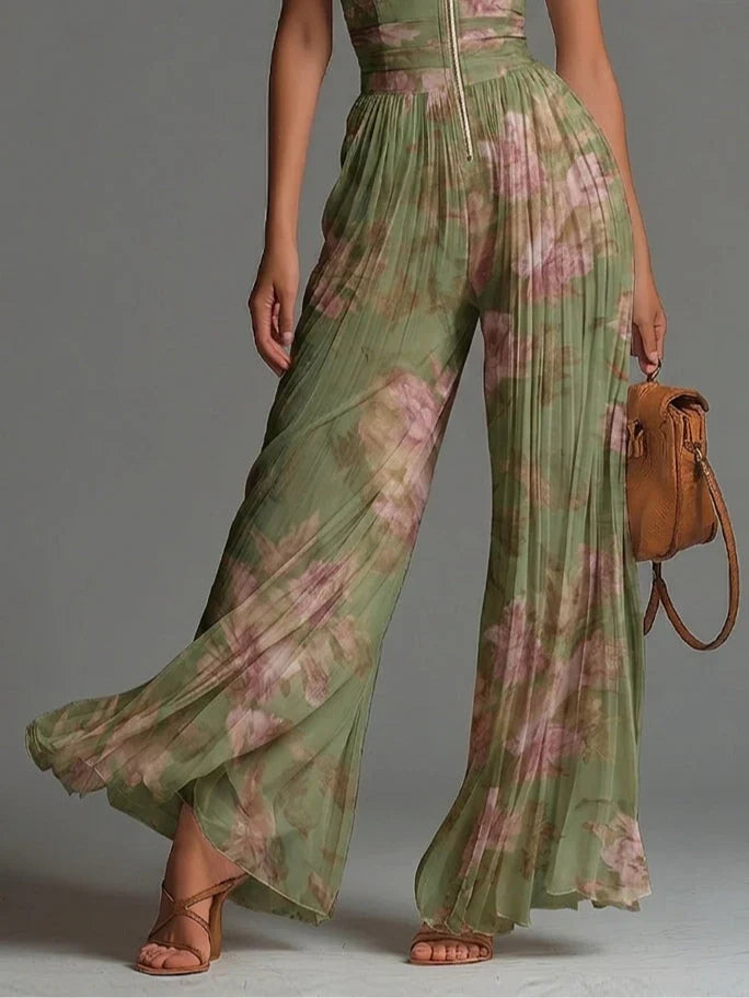 Charlotte™ | Flödande plisserad jumpsuit med gröna blommor